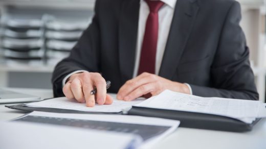 Financial adviser discussing debt solutions with a client seeking the best debt counsellor